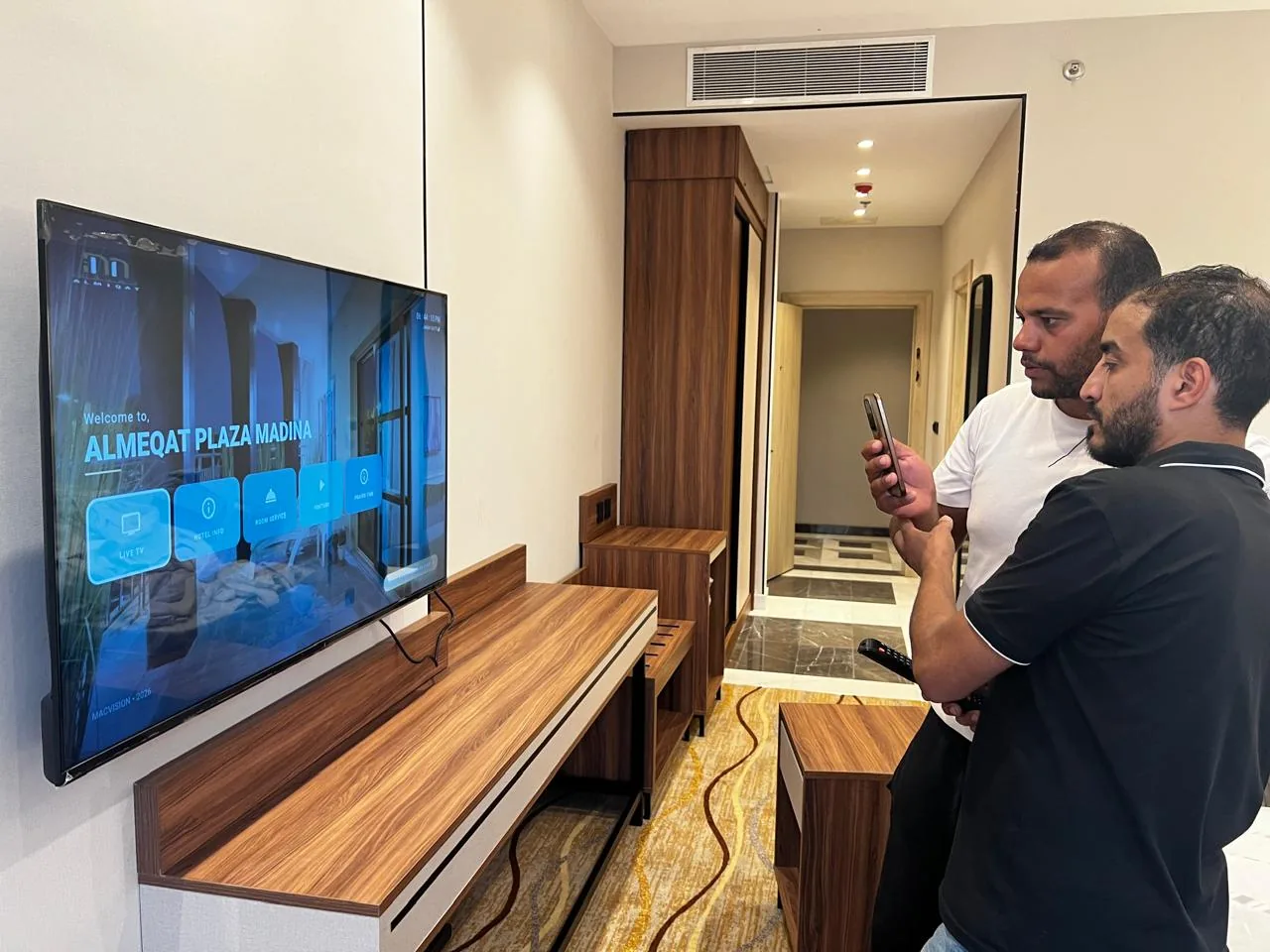 Jubail workforce-accommodation reference depicting hotel Guest Room IPTV Welcome Screen Setup - Al Meaqat Plaza Madinah